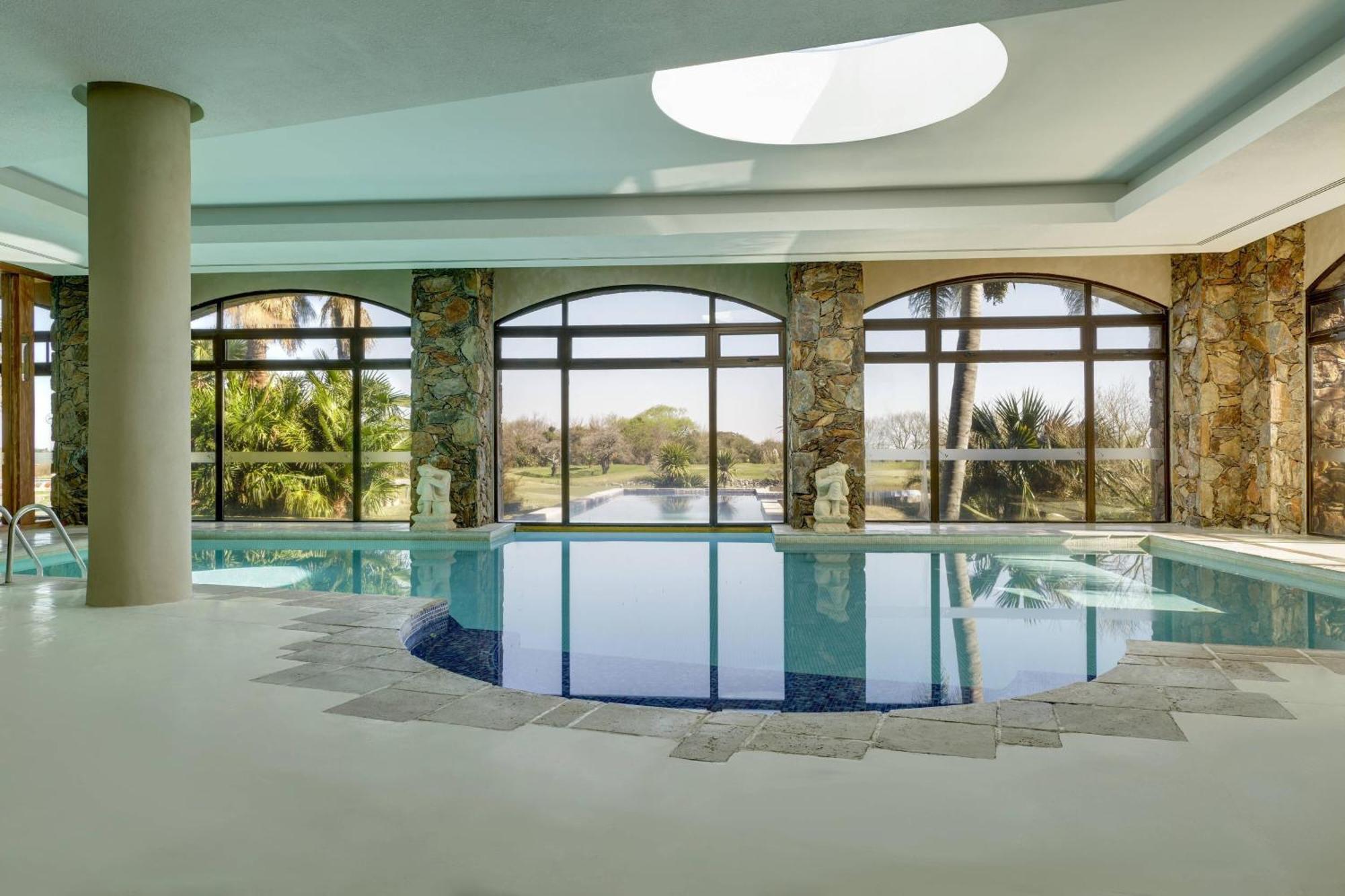 Sheraton Colonia Golf & Spa Resort Colonia del Sacramento Exteriér fotografie The swimming pool at the hotel
